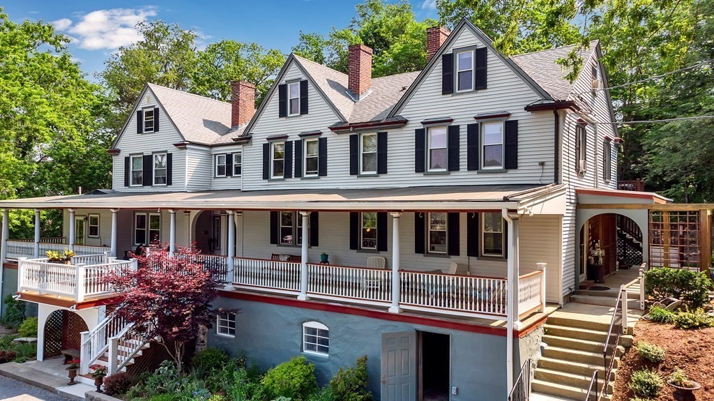509 Neck Road, Unit 1 Lancaster, MA 01523 - Photo 1 of 19 a front view of a house with a porch