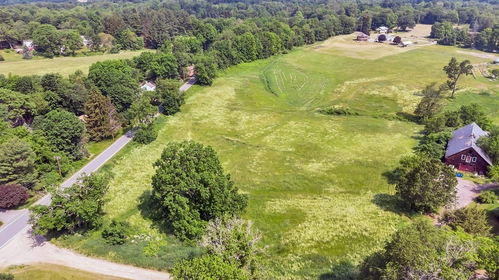 509 Neck Road, Unit 1 Lancaster, MA 01523 - Photo 19 of 19 a swimming pool with an outdoor space and seating area