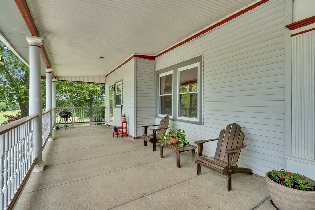 509 Neck Road, Unit 1 Lancaster, MA 01523 - Photo 3 of 19 a building outdoor space with patio furniture