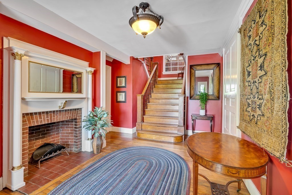 509 Neck Road, Unit 1 Lancaster, MA 01523 - Photo 5 of 19 a view of a livingroom with furniture and a fireplace