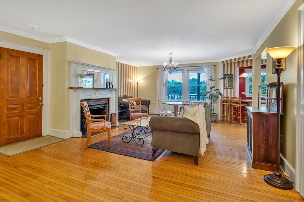 509 Neck Road, Unit 1 Lancaster, MA 01523 - Photo 7 of 19 a living room with furniture and a fireplace