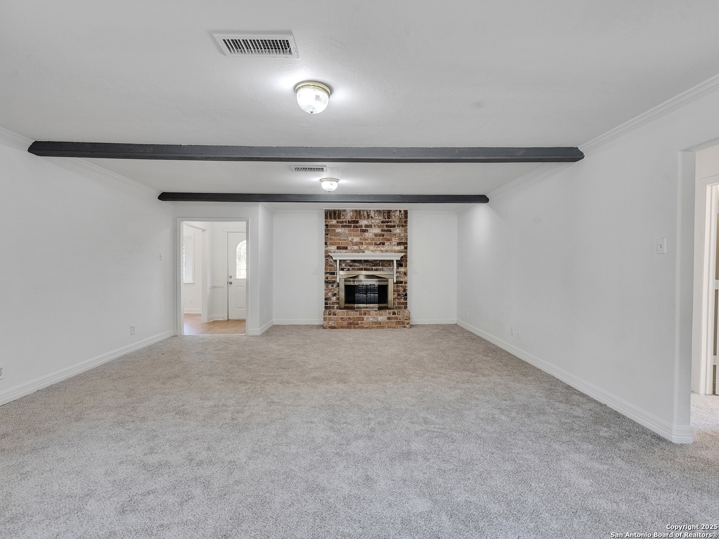 25423 Old Carriage Lane Spring, TX 77373 - Photo 12 of 36 a view of an empty room and fire place
