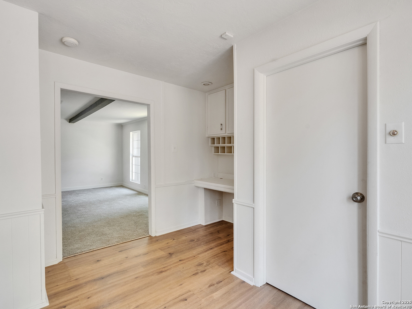 25423 Old Carriage Lane Spring, TX 77373 - Photo 15 of 36 a view of hallway with wooden floor