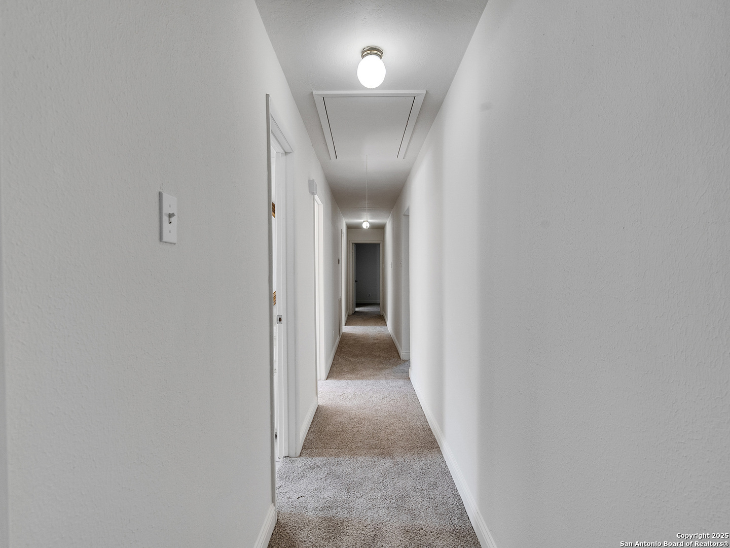 25423 Old Carriage Lane Spring, TX 77373 - Photo 21 of 36 a view of a hallway with wooden floor