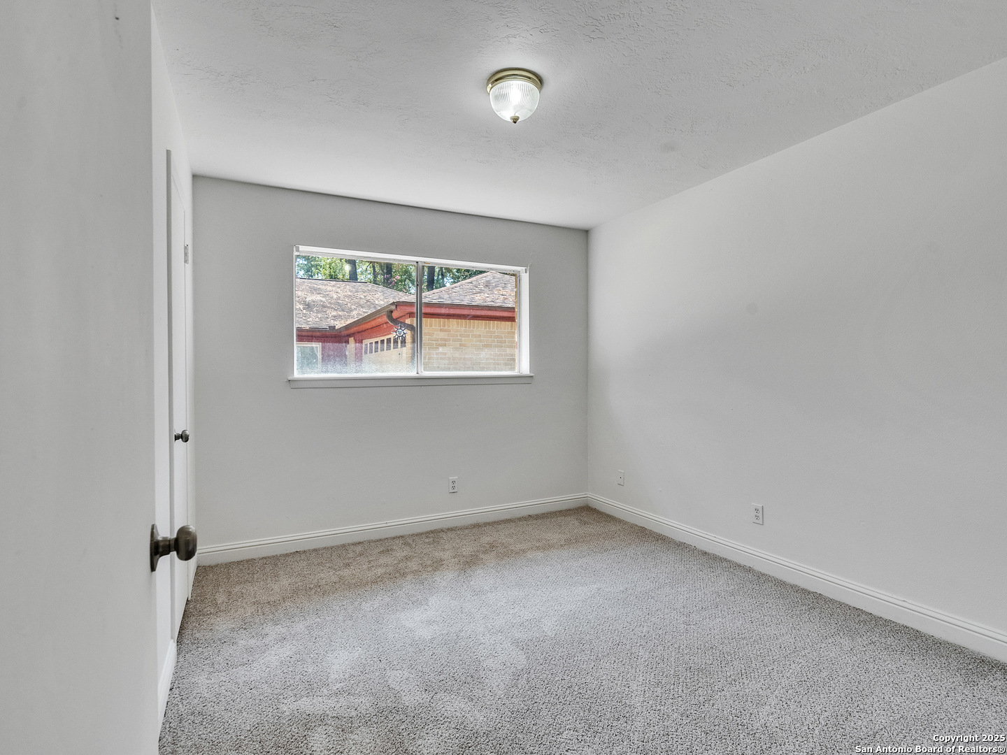 25423 Old Carriage Lane Spring, TX 77373 - Photo 23 of 36 an empty room with a window