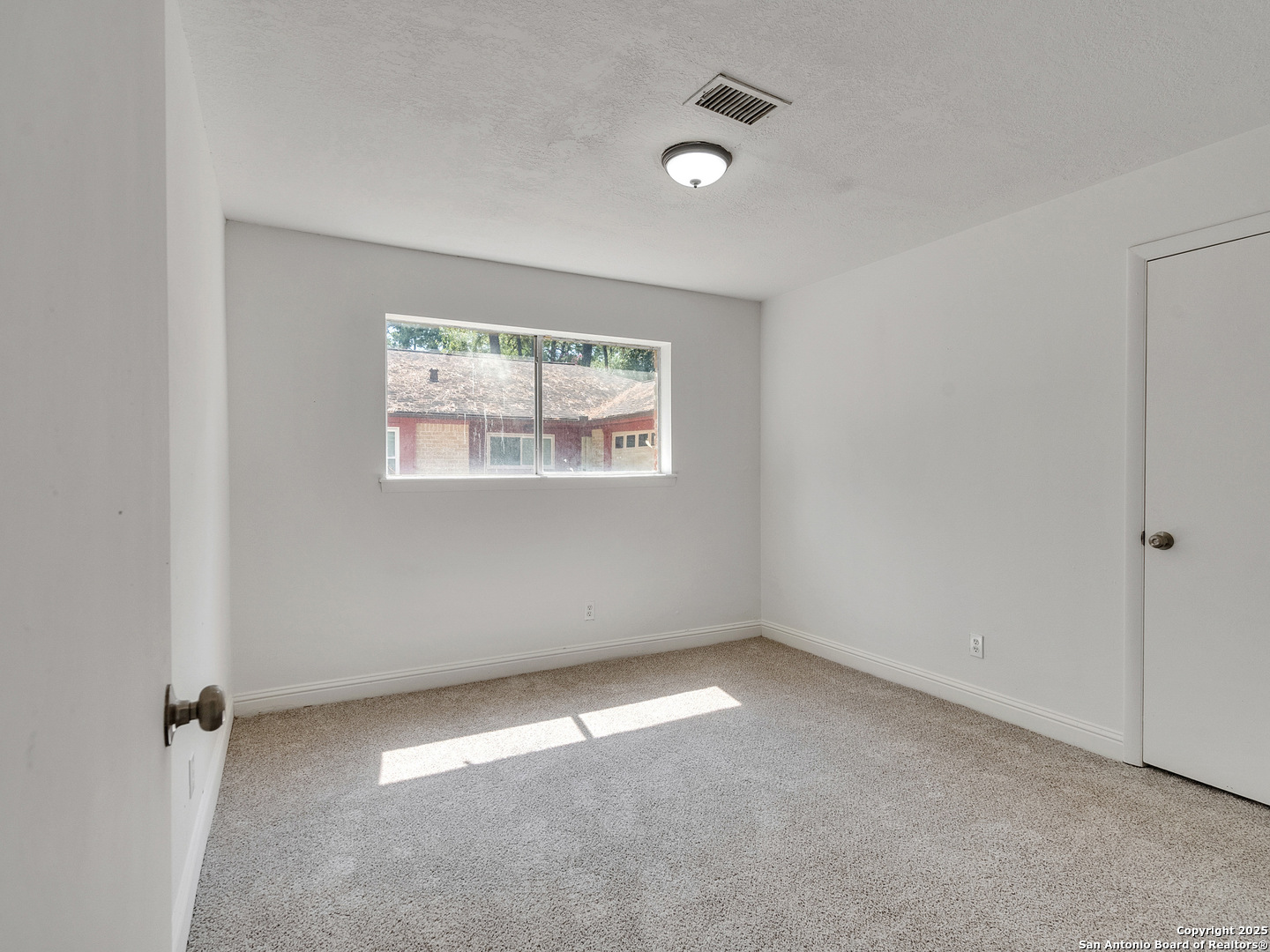 25423 Old Carriage Lane Spring, TX 77373 - Photo 24 of 36 an empty room with a window