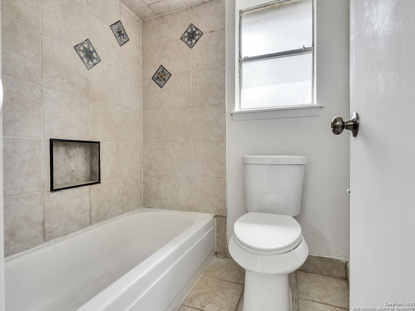 25423 Old Carriage Lane Spring, TX 77373 - Photo 28 of 36 a bathroom with a toilet and a bathtub