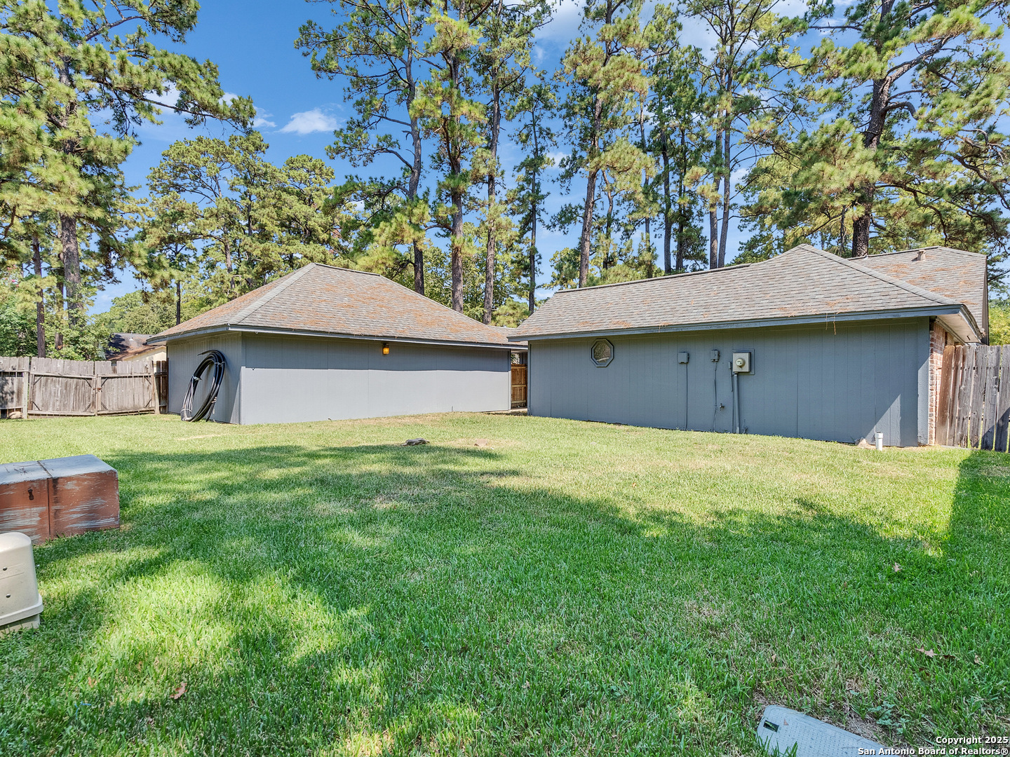 25423 Old Carriage Lane Spring, TX 77373 - Photo 31 of 36 a front view of a house with a garden