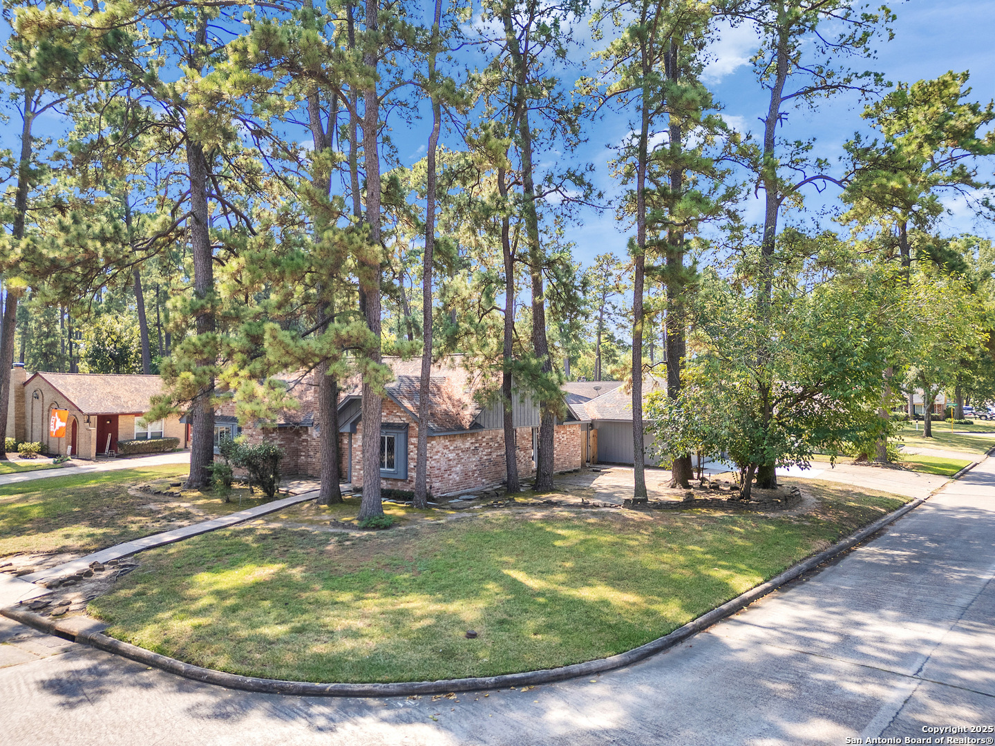 25423 Old Carriage Lane Spring, TX 77373 - Photo 5 of 36 a view of a fountain with a yard