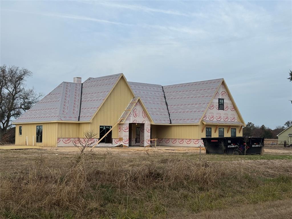 408 County Road 2115 Canton, TX 75103 - Photo 2 of 8 a house view with a garden space
