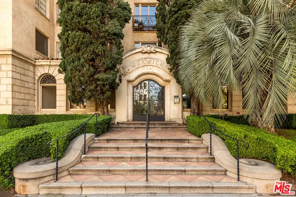 a view of a building with a garden