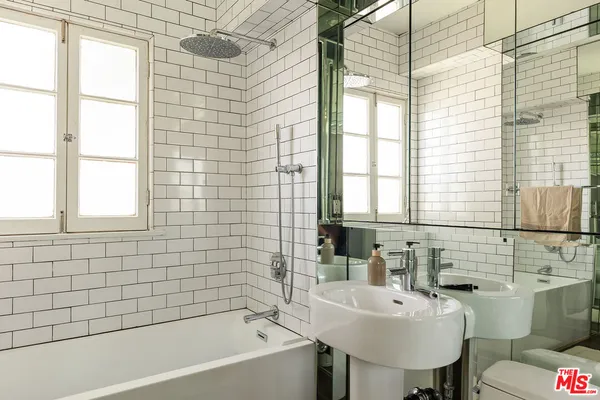 a bathroom with a sink and a bathtub