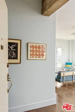 a view of a hallway with workspace