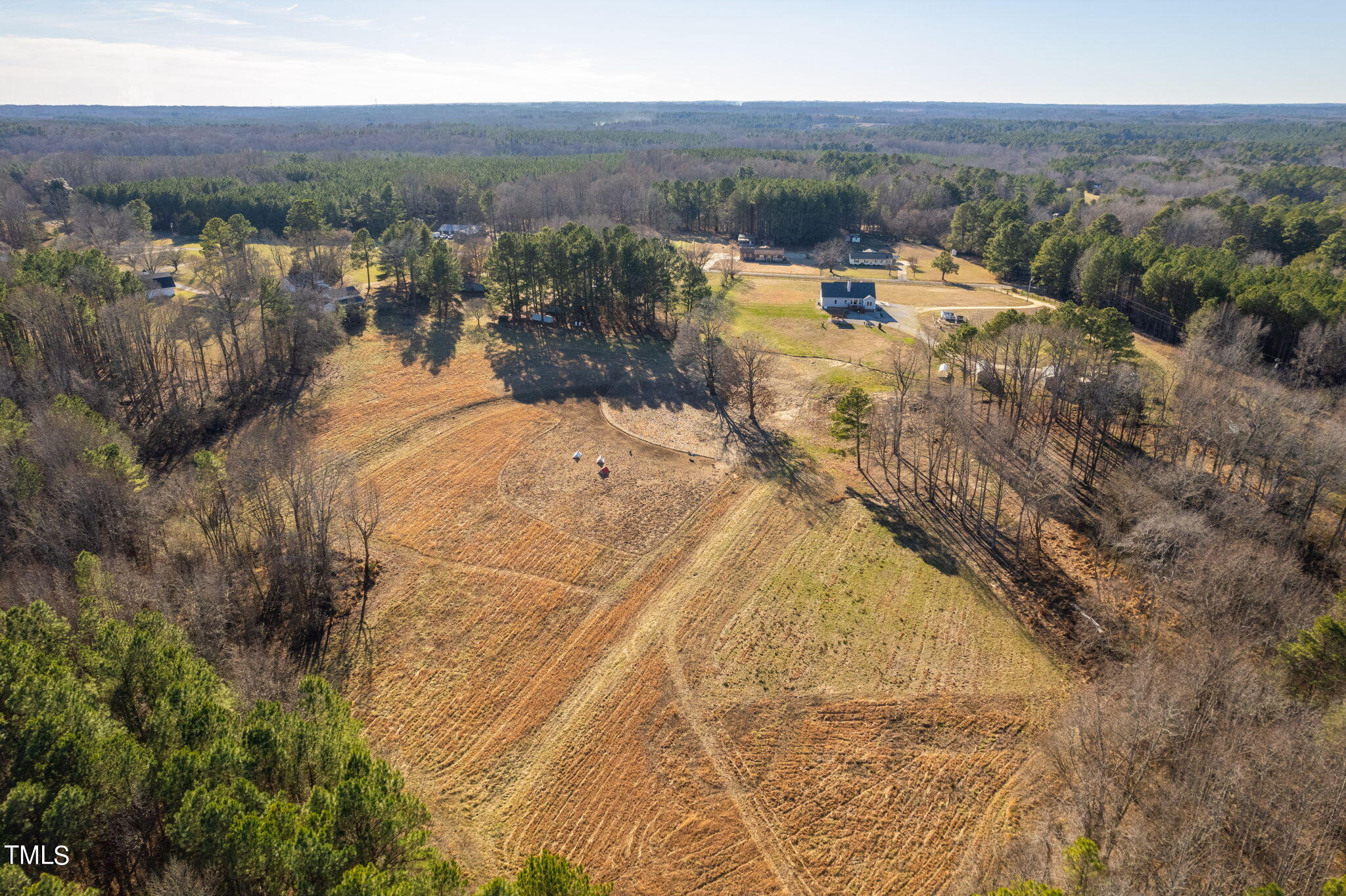 1428 Spring Valley Lake Road Henderson, NC 27537 - Photo 18 of 92 a view of a lake in middle of the town