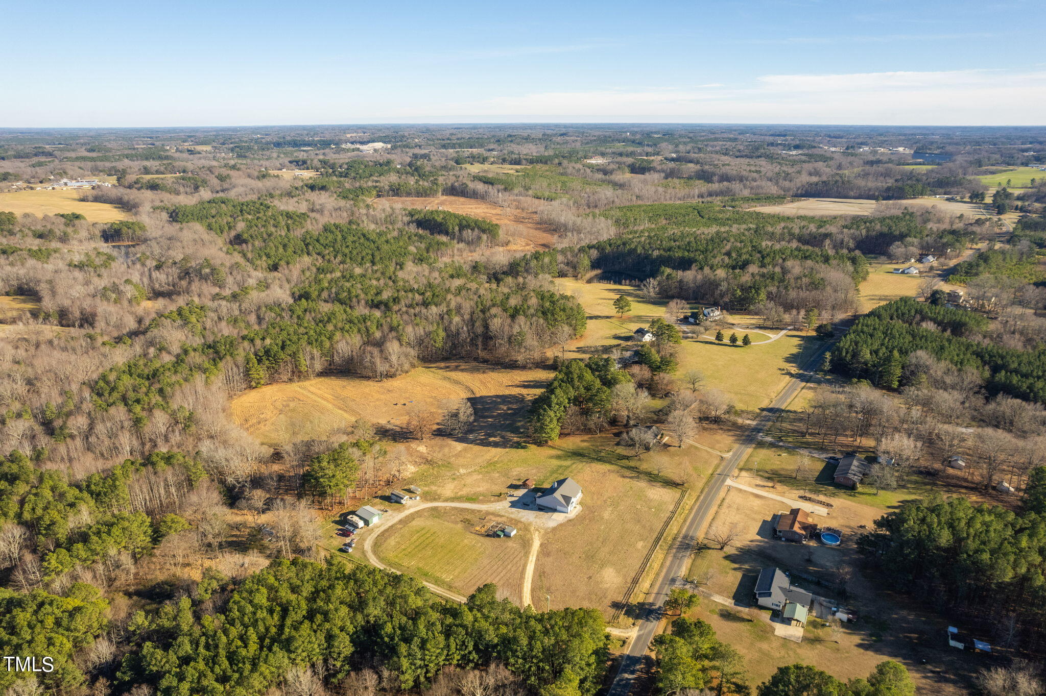 1428 Spring Valley Lake Road Henderson, NC 27537 - Photo 24 of 92 an aerial view of residential houses with outdoor space
