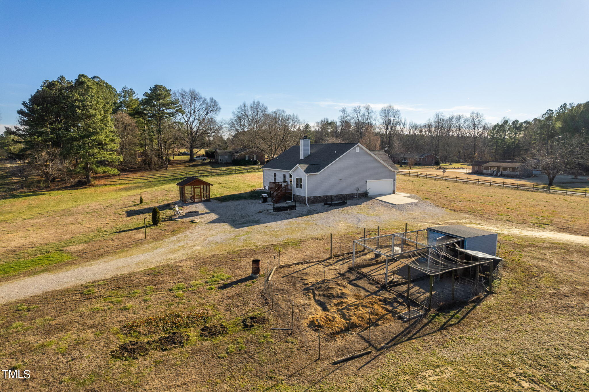 1428 Spring Valley Lake Road Henderson, NC 27537 - Photo 39 of 92 a view of a swimming pool with a yard