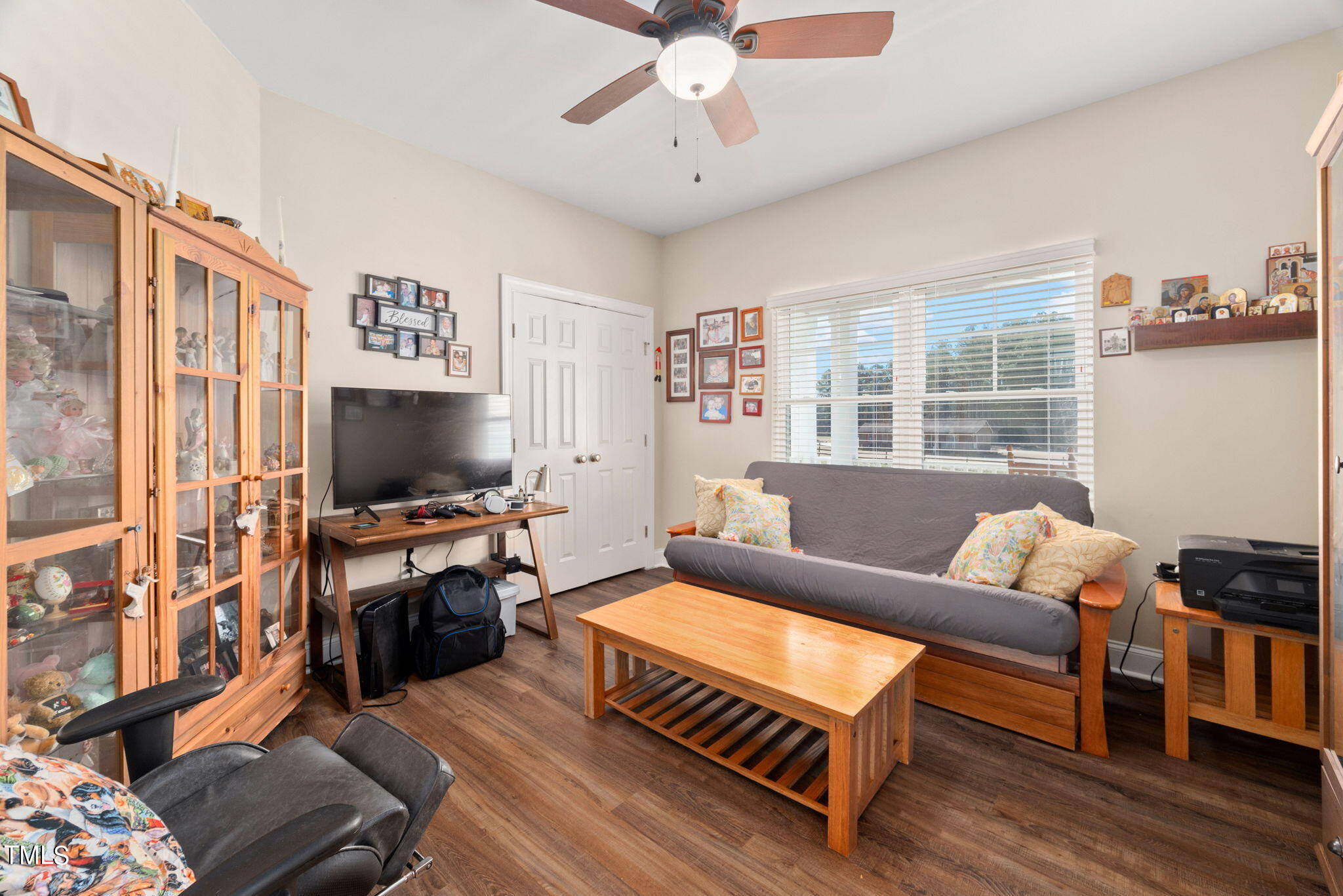 1428 Spring Valley Lake Road Henderson, NC 27537 - Photo 53 of 92 a living room with furniture and a flat screen tv