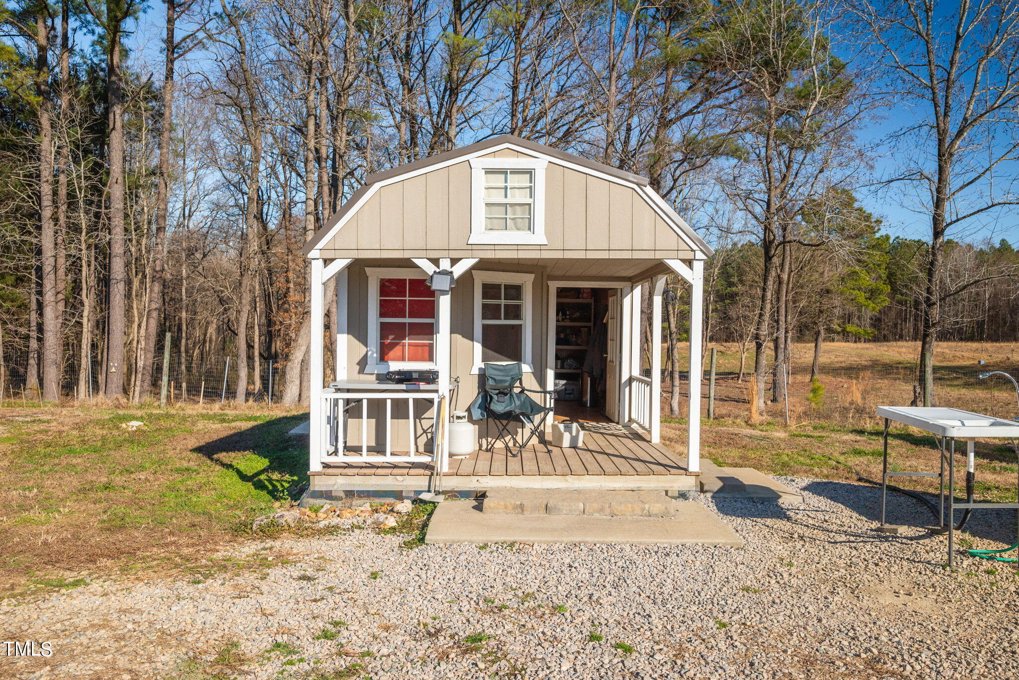 1428 Spring Valley Lake Road Henderson, NC 27537 - Photo 82 of 92 a front view of a house with a outdoor view