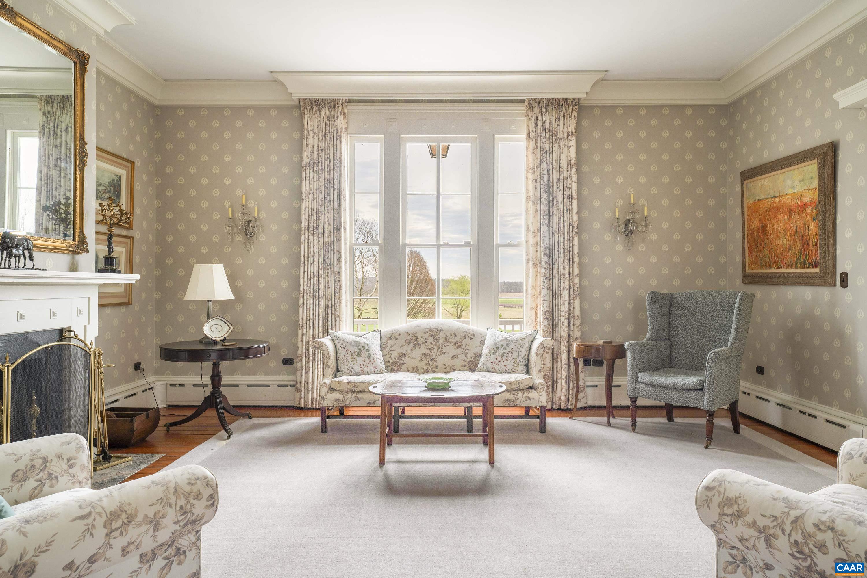 23501 A Greenville Road Culpeper, VA 22701 - Photo 21 of 69 a living room with furniture and a fireplace