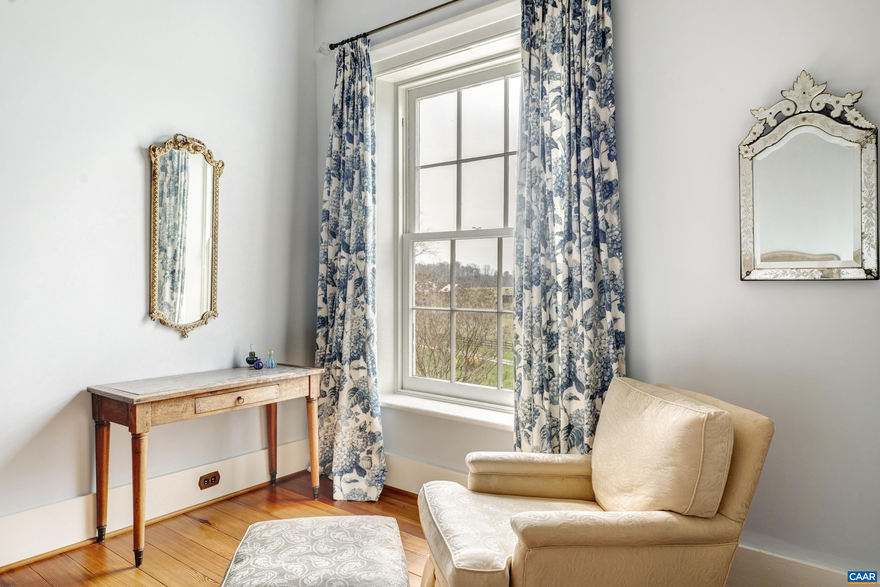 23501 A Greenville Road Culpeper, VA 22701 - Photo 26 of 69 a living room with furniture and a window