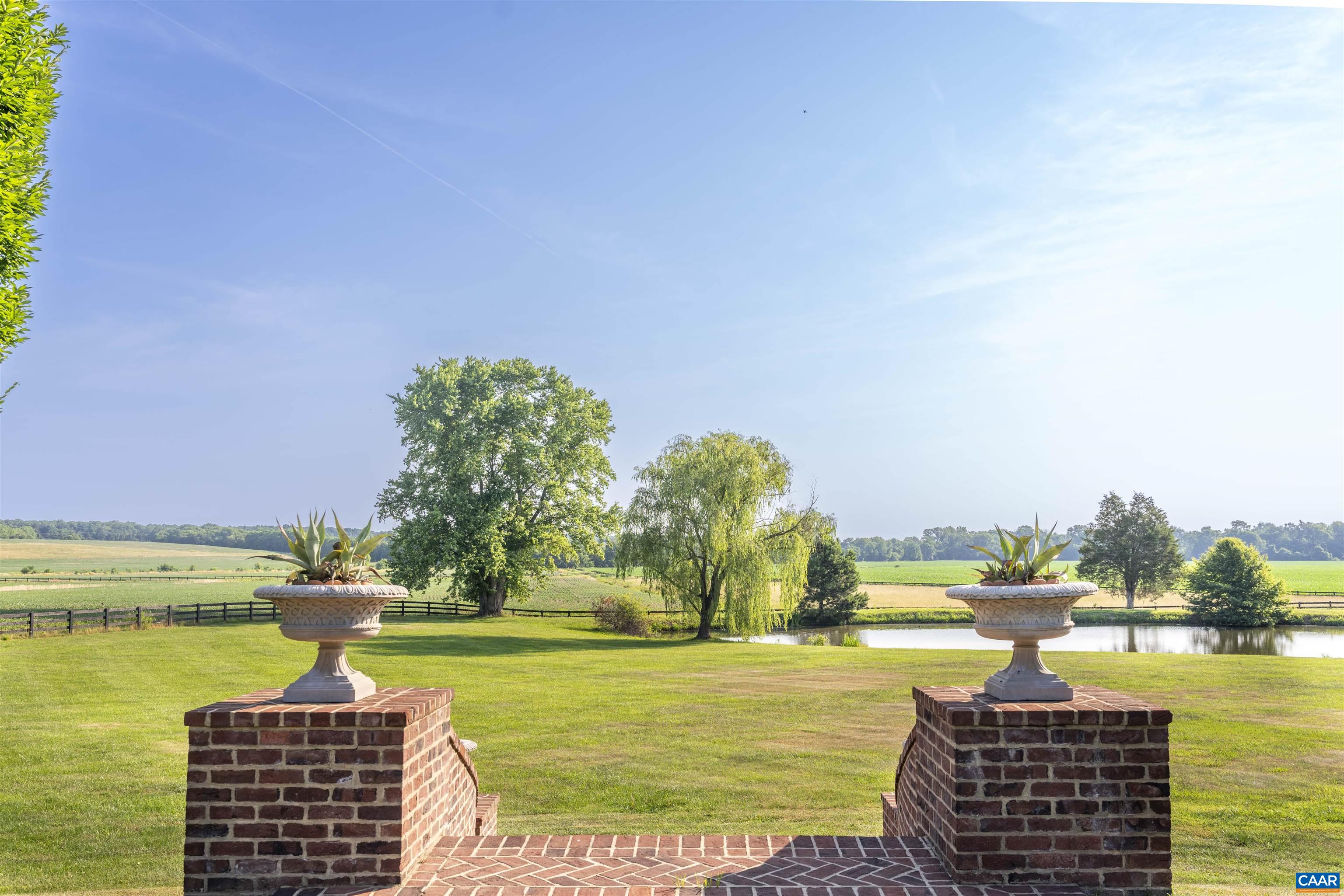 23501 A Greenville Road Culpeper, VA 22701 - Photo 39 of 69 a lake with tall building in the background
