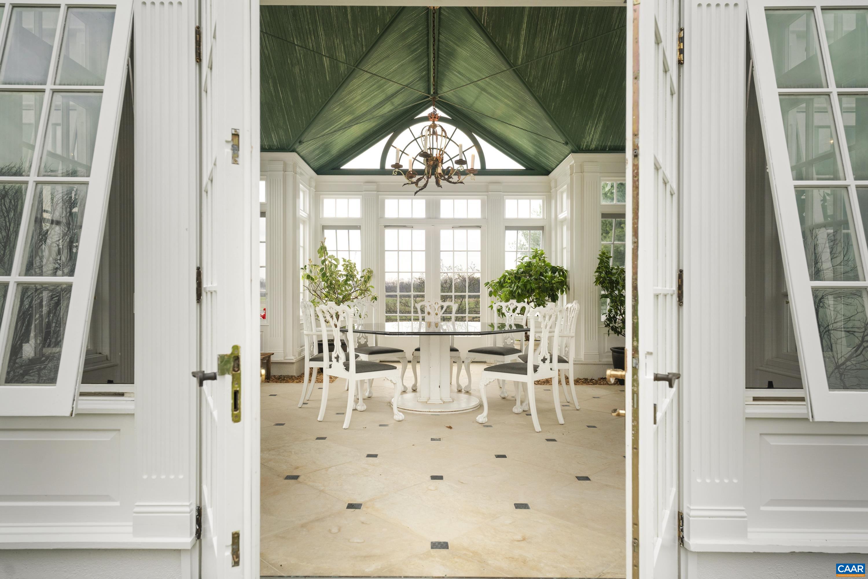 23501 A Greenville Road Culpeper, VA 22701 - Photo 42 of 69 a view of a dining room with furniture window and outside view