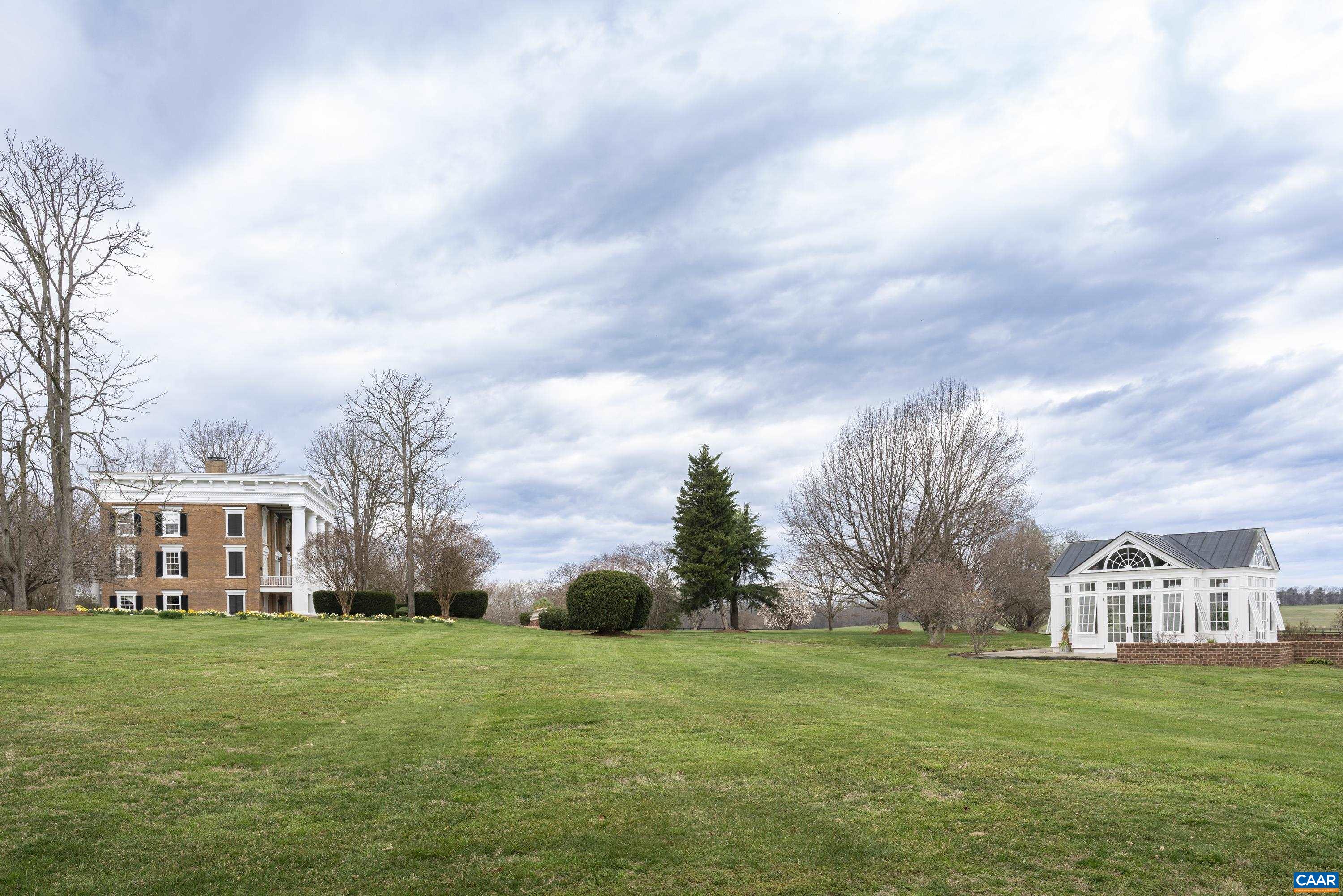 23501 A Greenville Road Culpeper, VA 22701 - Photo 45 of 69 a front view of a house with a garden
