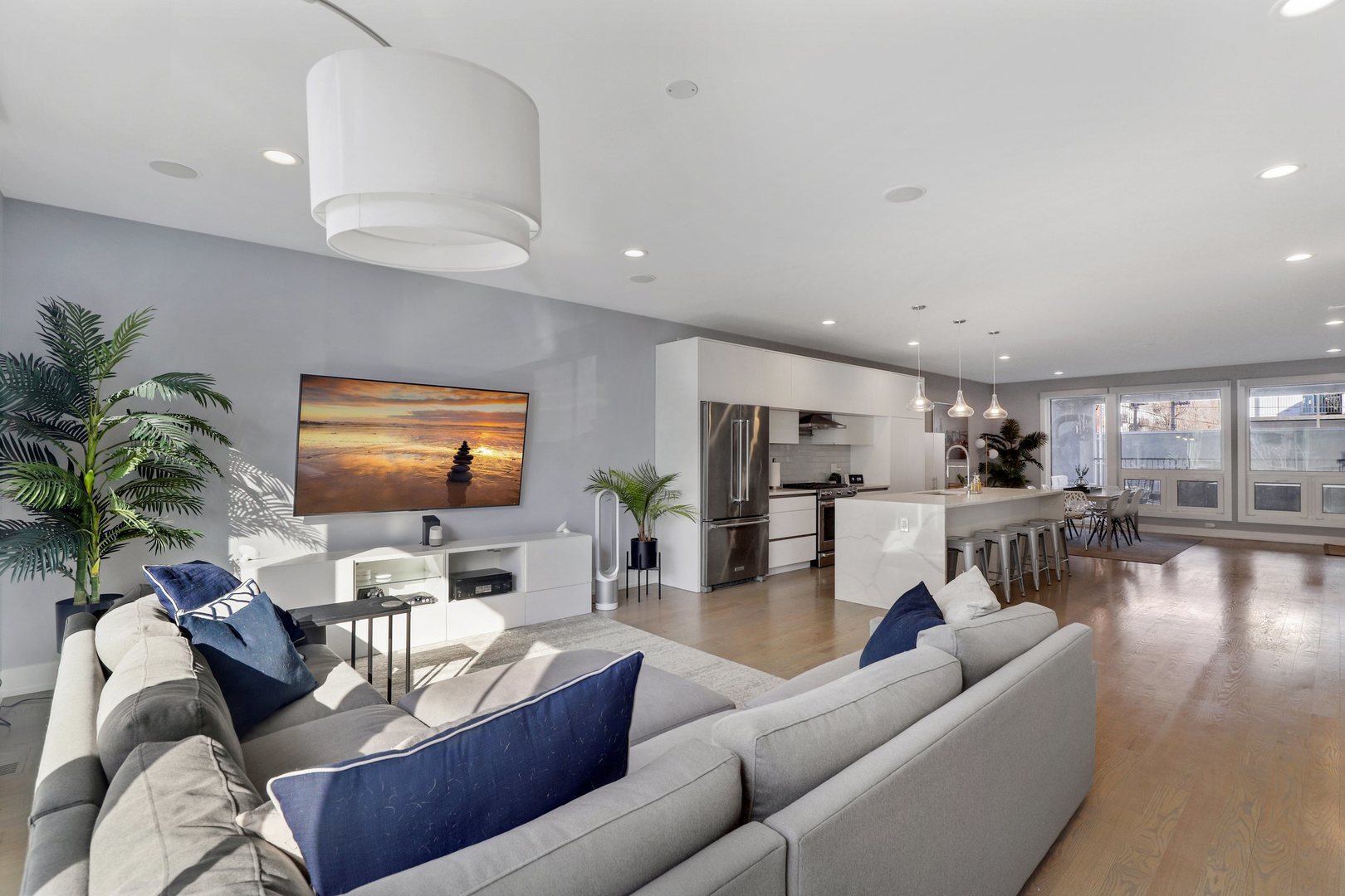 730 West 17th Place, Unit 1W Chicago, IL 60616 - Photo 2 of 26 a living room with furniture and a flat screen tv