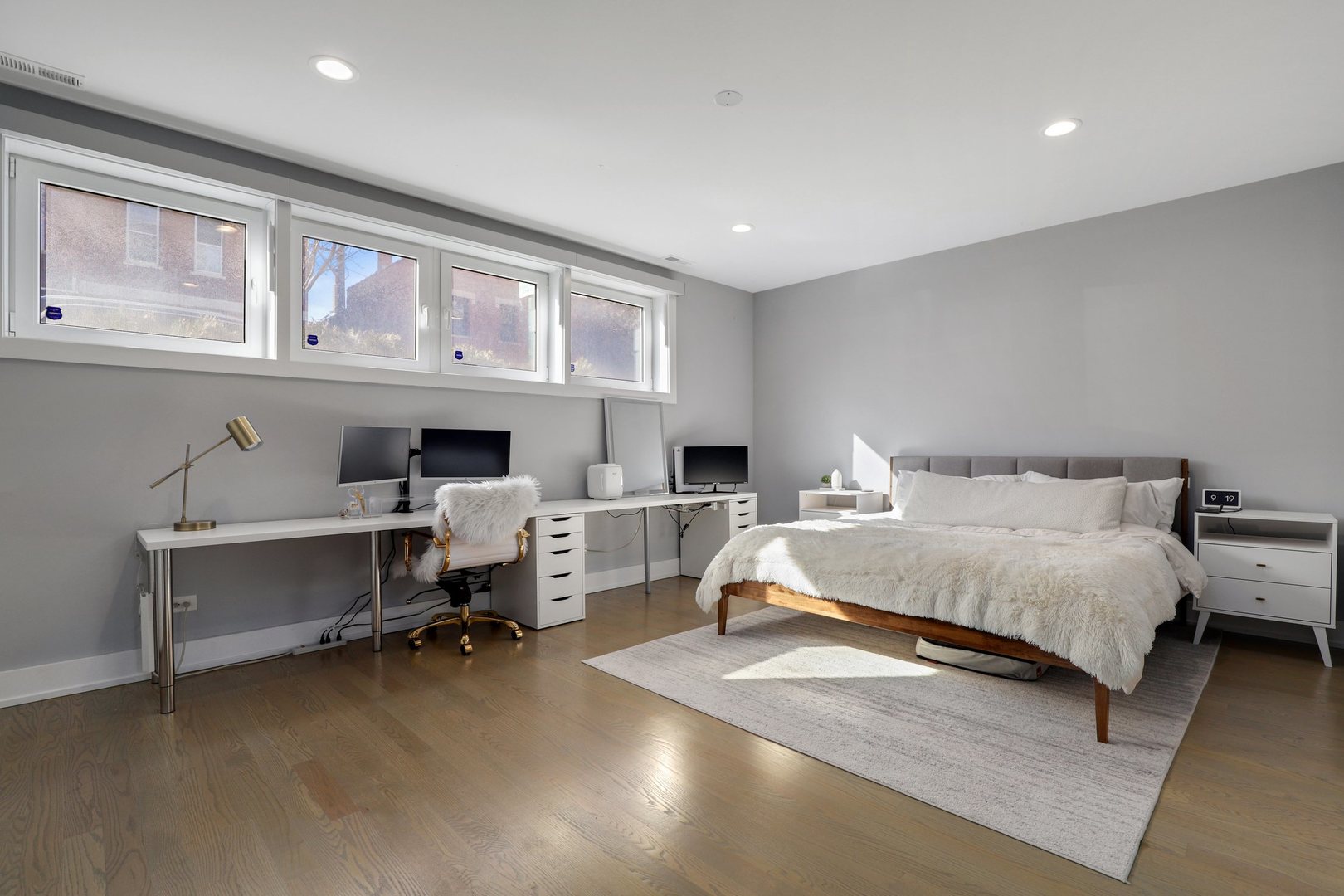 730 West 17th Place, Unit 1W Chicago, IL 60616 - Photo 11 of 26 a living room with furniture gym equipment and a window