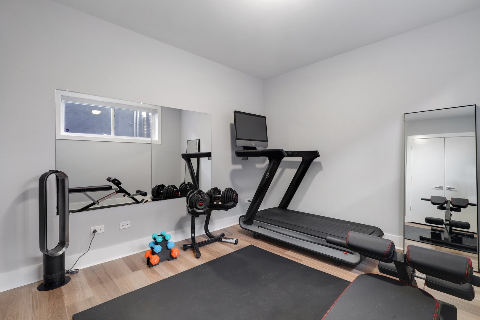 730 West 17th Place, Unit 1W Chicago, IL 60616 - Photo 18 of 26 a view of a room with gym equipment