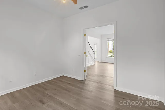 a bathroom with a sink vanity granite tub and shower