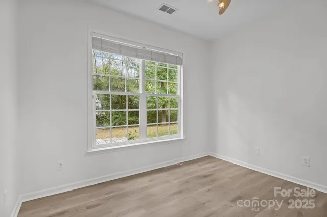 a bathroom with a bathtub a shower and a sink