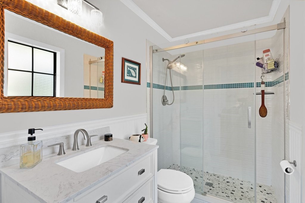 549 Layport Drive Sebastian, FL 32958 - Photo 19 of 35 a bathroom with a sink a toilet and shower