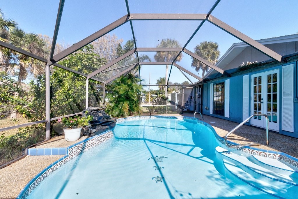 549 Layport Drive Sebastian, FL 32958 - Photo 24 of 35 a view of a patio with a table and chairs