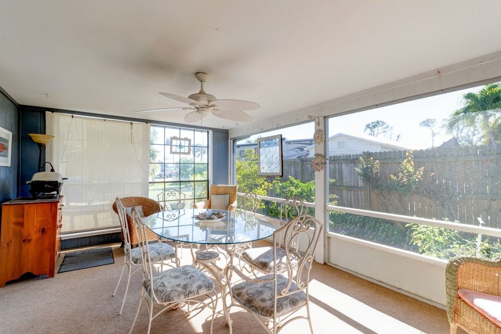 549 Layport Drive Sebastian, FL 32958 - Photo 25 of 35 a view of a dining room with furniture window and outside view