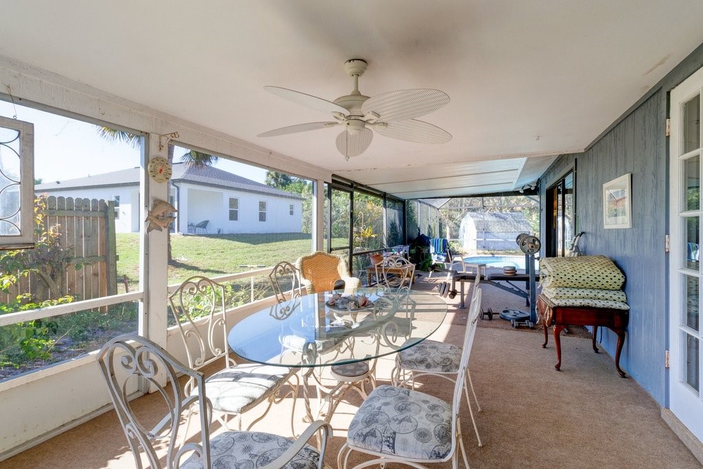 549 Layport Drive Sebastian, FL 32958 - Photo 26 of 35 a view of a dining room with furniture window and outside view