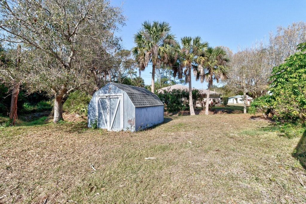549 Layport Drive Sebastian, FL 32958 - Photo 27 of 35 a view of backyard with green space