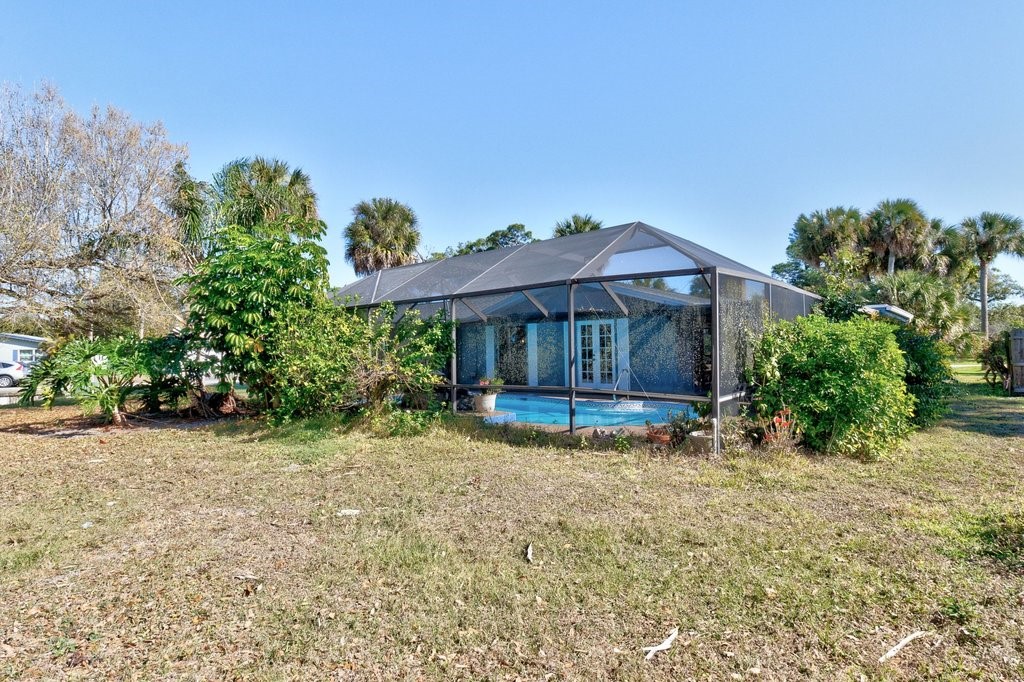 549 Layport Drive Sebastian, FL 32958 - Photo 28 of 35 a view of a house with a yard and sitting area