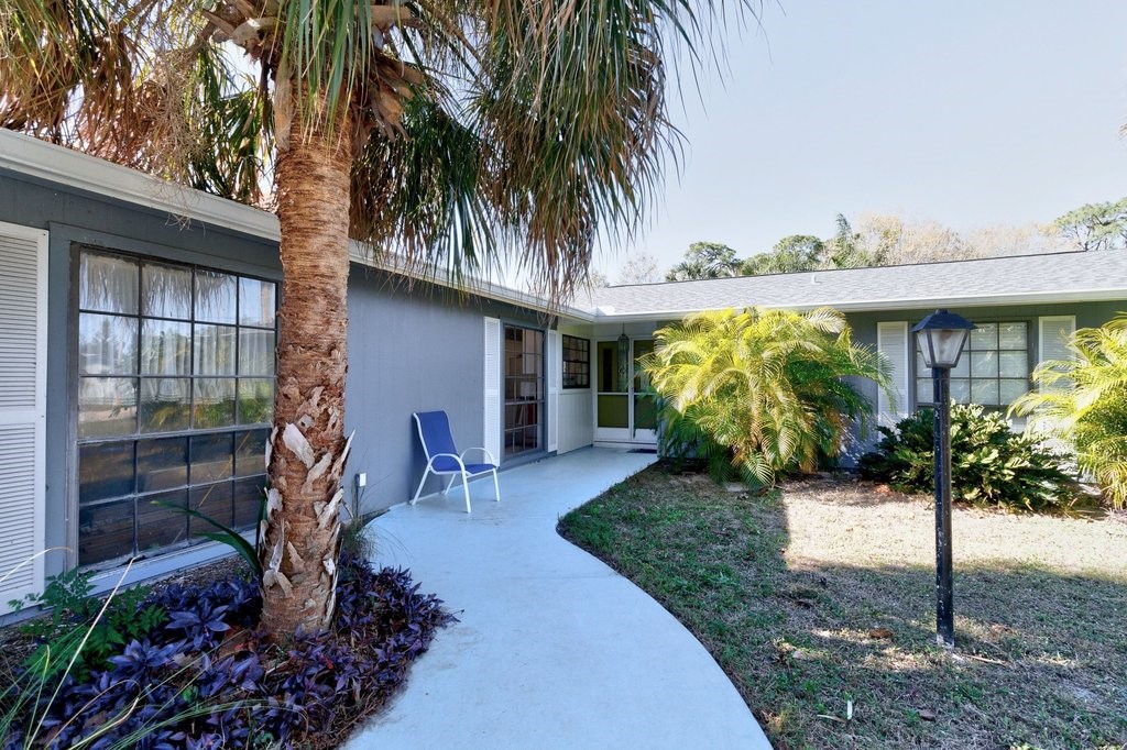 549 Layport Drive Sebastian, FL 32958 - Photo 4 of 35 a front view of a house with garden