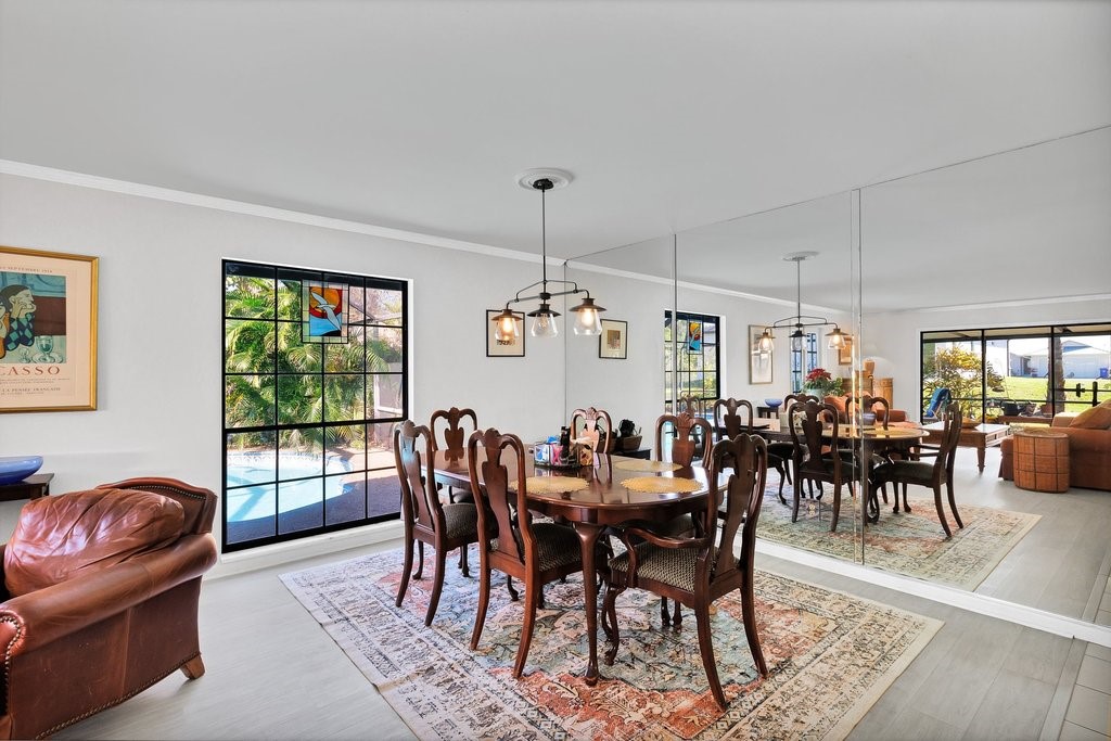 549 Layport Drive Sebastian, FL 32958 - Photo 6 of 35 a view of a dining room with furniture window and outside view