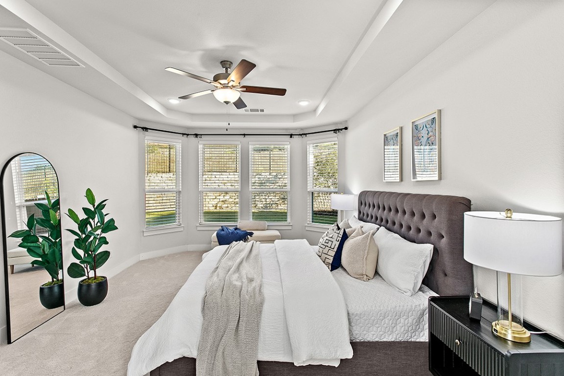 1265 Hazy Hills Loop Dripping Springs, TX 78620 - Photo 19 of 40 a living room with furniture and a large window