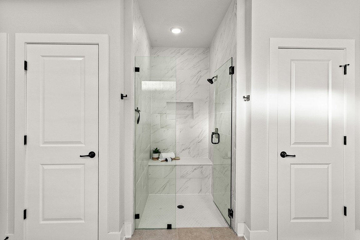 1265 Hazy Hills Loop Dripping Springs, TX 78620 - Photo 21 of 40 a bathroom with a shower