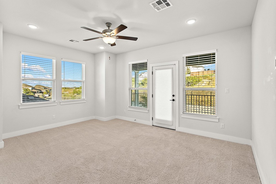 1265 Hazy Hills Loop Dripping Springs, TX 78620 - Photo 29 of 40 a view of an empty room with a window