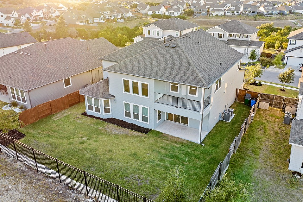 1265 Hazy Hills Loop Dripping Springs, TX 78620 - Photo 40 of 40 a aerial view of residential houses with yard