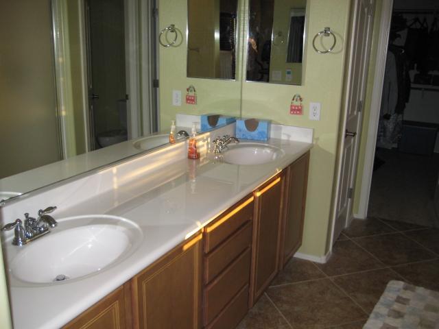 3247 East Tyson Street Gilbert, AZ 85295 - Photo 23 of 34 a bathroom with a sink and a mirror