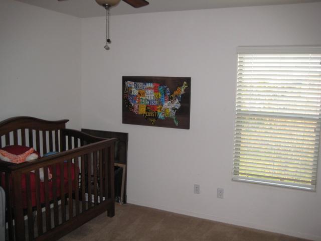 3247 East Tyson Street Gilbert, AZ 85295 - Photo 25 of 34 a bedroom with a bed and a window