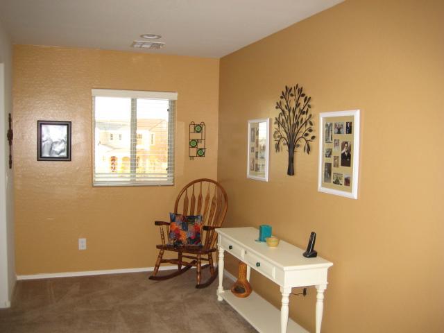 3247 East Tyson Street Gilbert, AZ 85295 - Photo 27 of 34 a room with gym equipment and windows