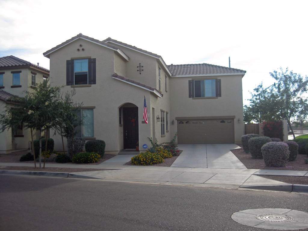 3247 East Tyson Street Gilbert, AZ 85295 - Photo 31 of 34 a front view of a house with garden