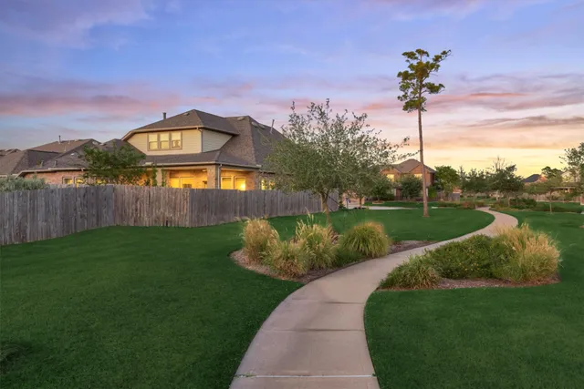 a view of a garden with a lake view