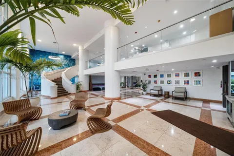 a living room with furniture and lots of furniture